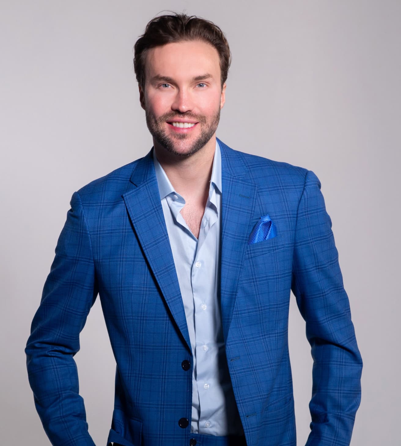 Dr. Sergei Kalsow wearing a blue suit